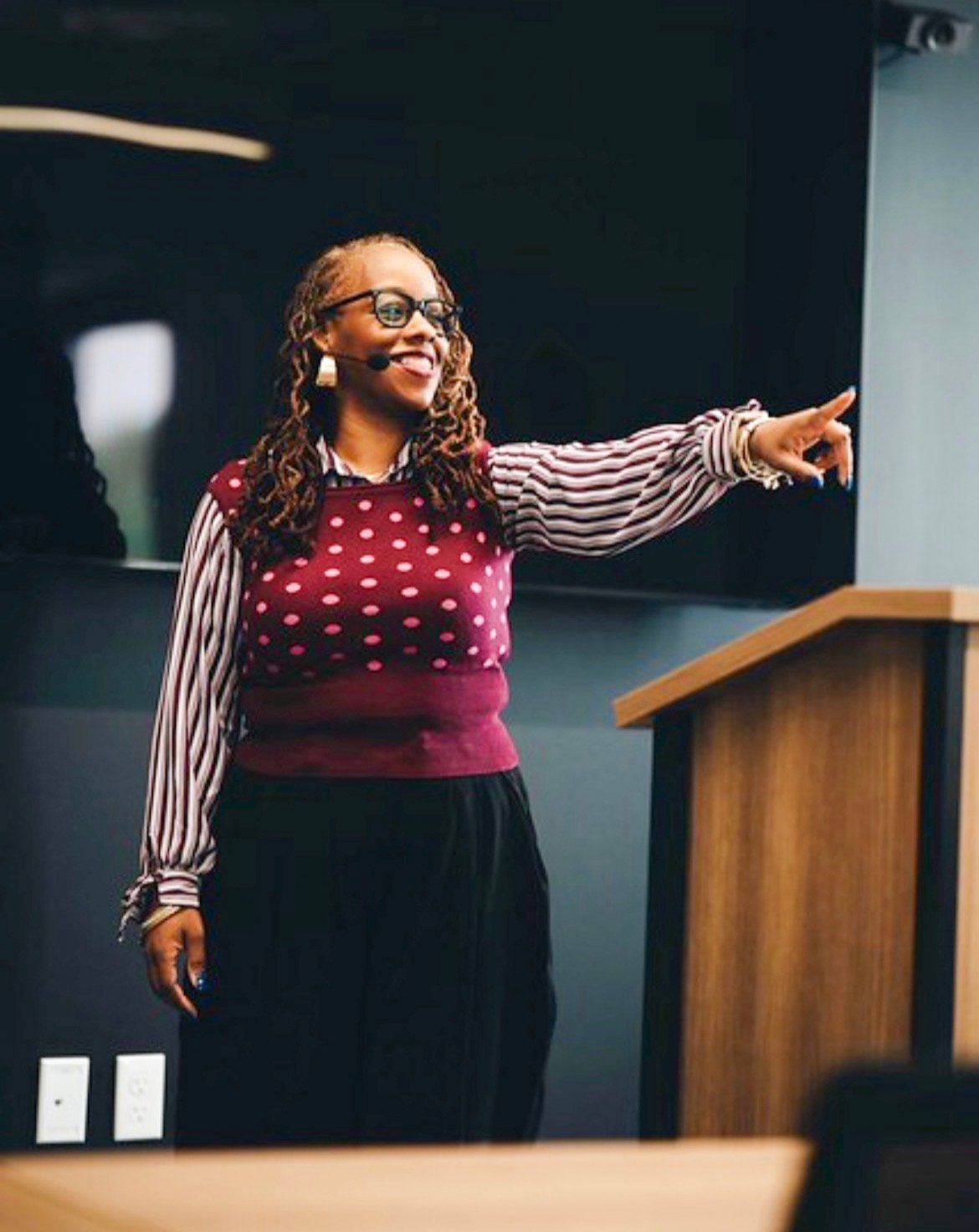 Kia Delaney speaking at a keynote event